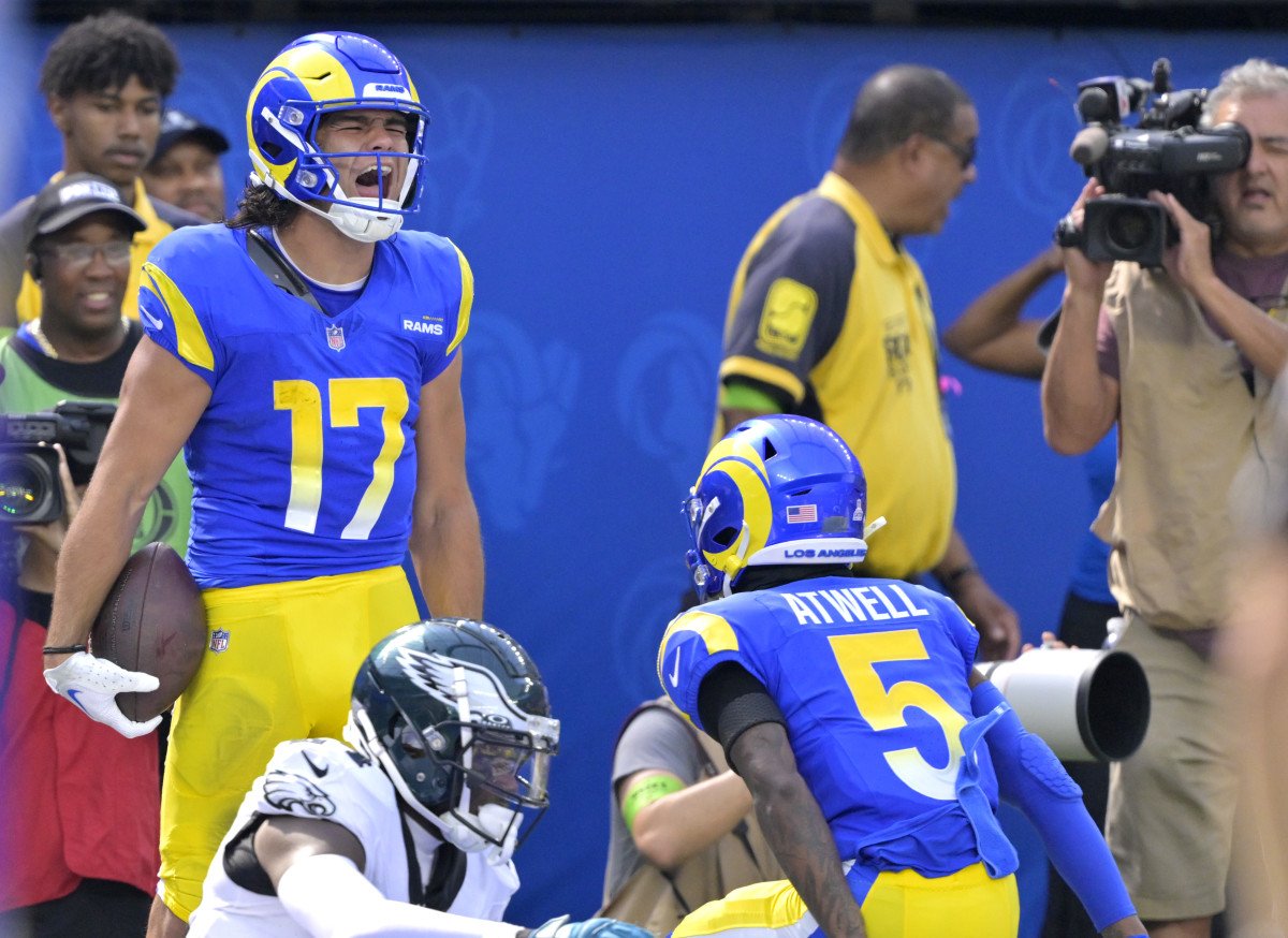 Nacua celebrates a touchdown with fellow receiver Tutu Atwell.